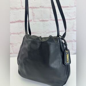 CHANEL Vintage Drawstring Black Leather Logo Shoulder Bag